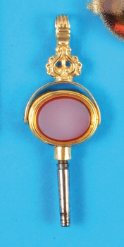 Goldener Taschenuhrschlüssel, 14 c t., m it Halbedelstein,