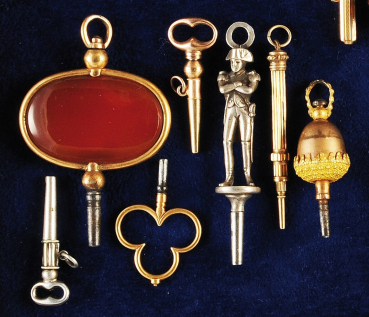 Sammlung mit 7 antiken Taschenuhrschlüsseln,
