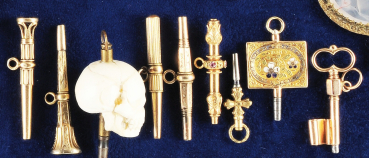 Sammlung mit 9 Taschenuhrschlüsseln,