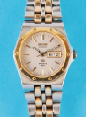 Seiko Quartz Sport 100 Bi-Color-Damen-Armbanduhr mit Zentralsekunde, Wochentag, Datum und Originaletui,