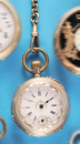 Alpenländische Silbertaschenuhr mit Metallkette und Anhänger,