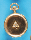 Tavannes, Damen-Goldtaschenuhr, auf Werkdeckel montierte Verzierung in Blattform,