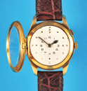 Goldene Blinden-Automatic-Armbanduhr, Lünette als Sprungdeckel,