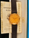 IWC-Gold-Armbanduhr mit Zentralsekunde, Original-Etui und Original-Zertifikat,