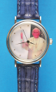 Stahlarmbanduhr mit Automat und Darstellung von Papst Johannes Paul II. mit winkendem Arm