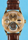 Raoul U. Braun, große, vergoldete Armbanduhr mit Tourbillon, Tag/Nacht -anzeige und Gangreserve,