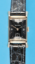 Bulova Watch Co., USA, rechteckige 14-ct.-Gold-Armbanduhr mit besonderen Anstößen und schwarzem Zifferblatt