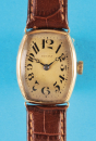 Tiffany, Damen-Goldarmbanduhr, tonneauförmiges 14-ct.-Goldgehäuse mit Scharnier,